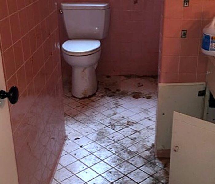 Bathroom filled with soot after fire damage