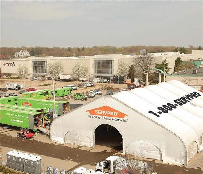White SERVPRO tent building and equipment.